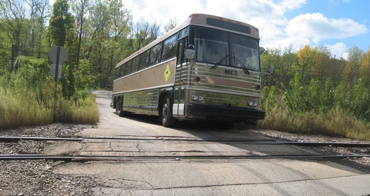 Getting a Bus Stuck at a Railroad Crossing - bus conversion photo
