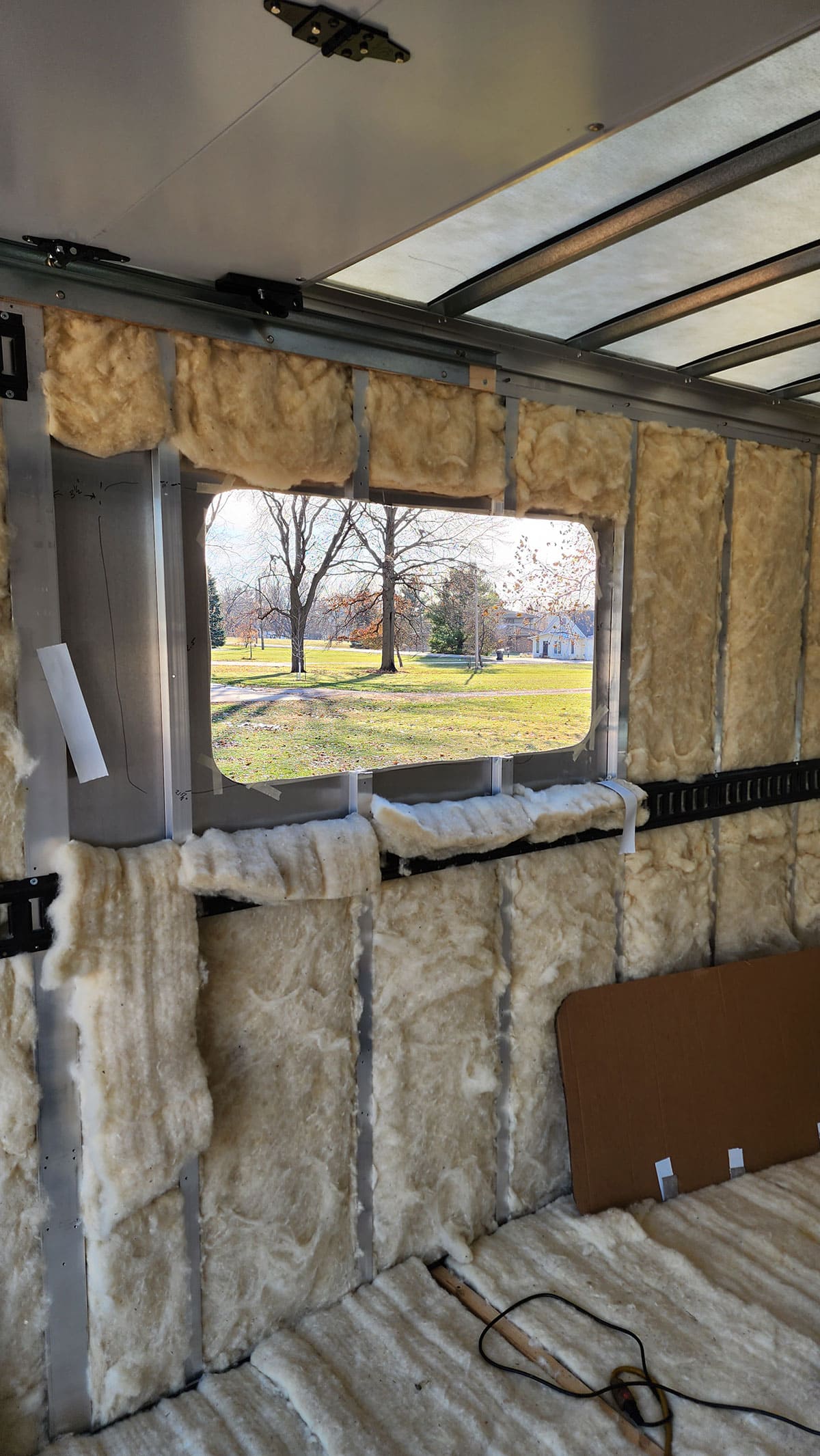 Hole cut for window on driver’s side.
