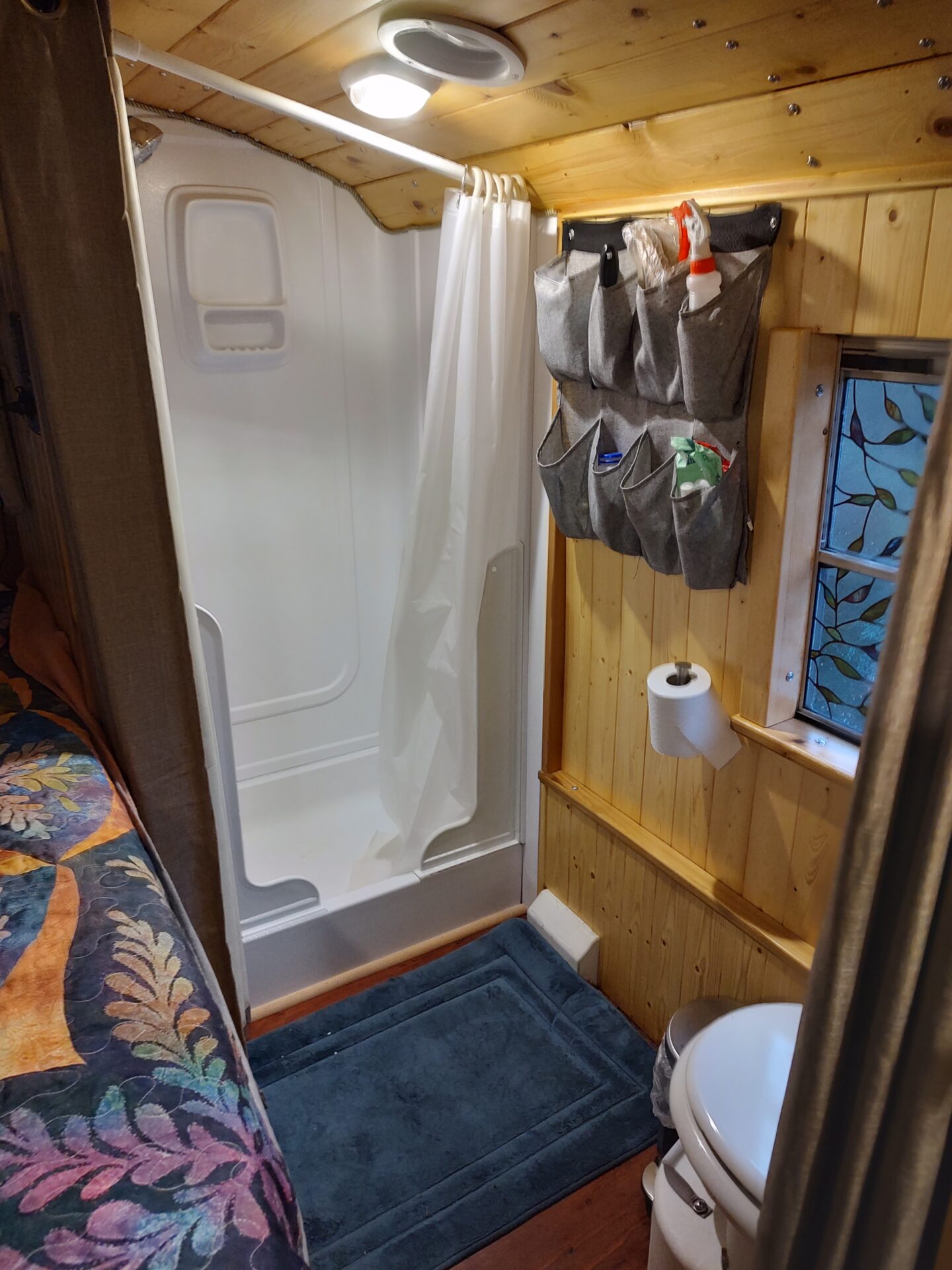 17 Bathroom with 25x30 shower, and AirHead toilet Miles, the Bus – A 28’ 2005 Freightliner/Thomas FS-65 - bus conversion photo