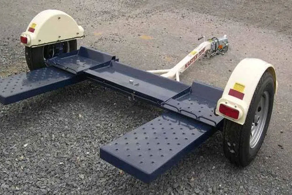 Should You Use a Toad, Trailer, or Tow Dolly for Your Bus Conversion? - bus conversion photo