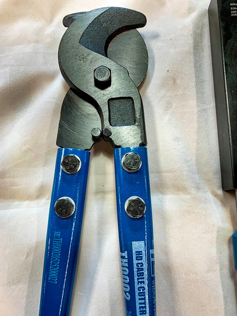 Tools for Cutting and Crimping Ends on Large Electrical Cable - bus conversion photo