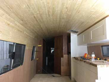 Comfort Year-Round With EHP (Insulating Your Bus Conversion) - bus conversion photo