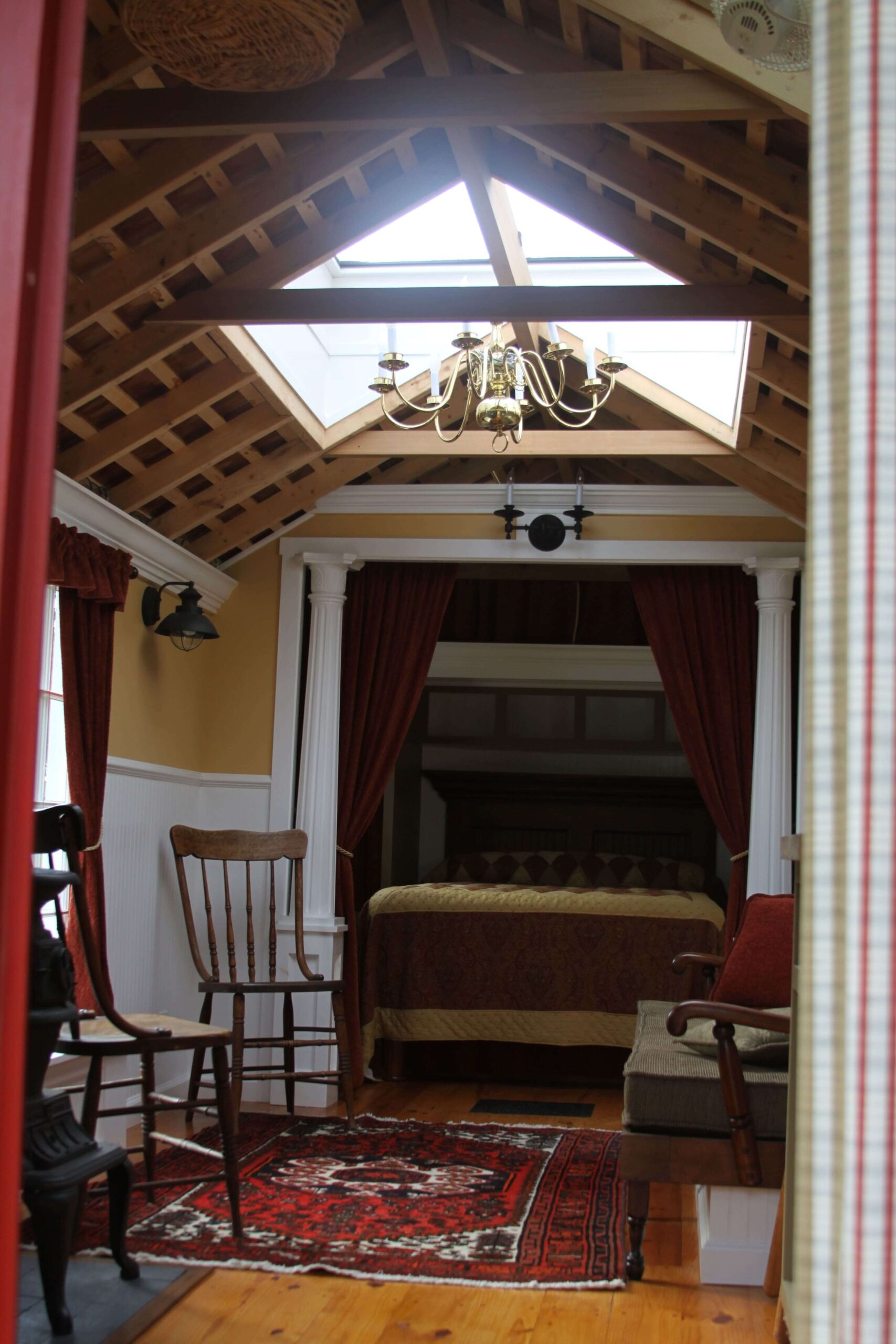 Copper clad skylight and classic tarnished chandelier provide ample light day or night.