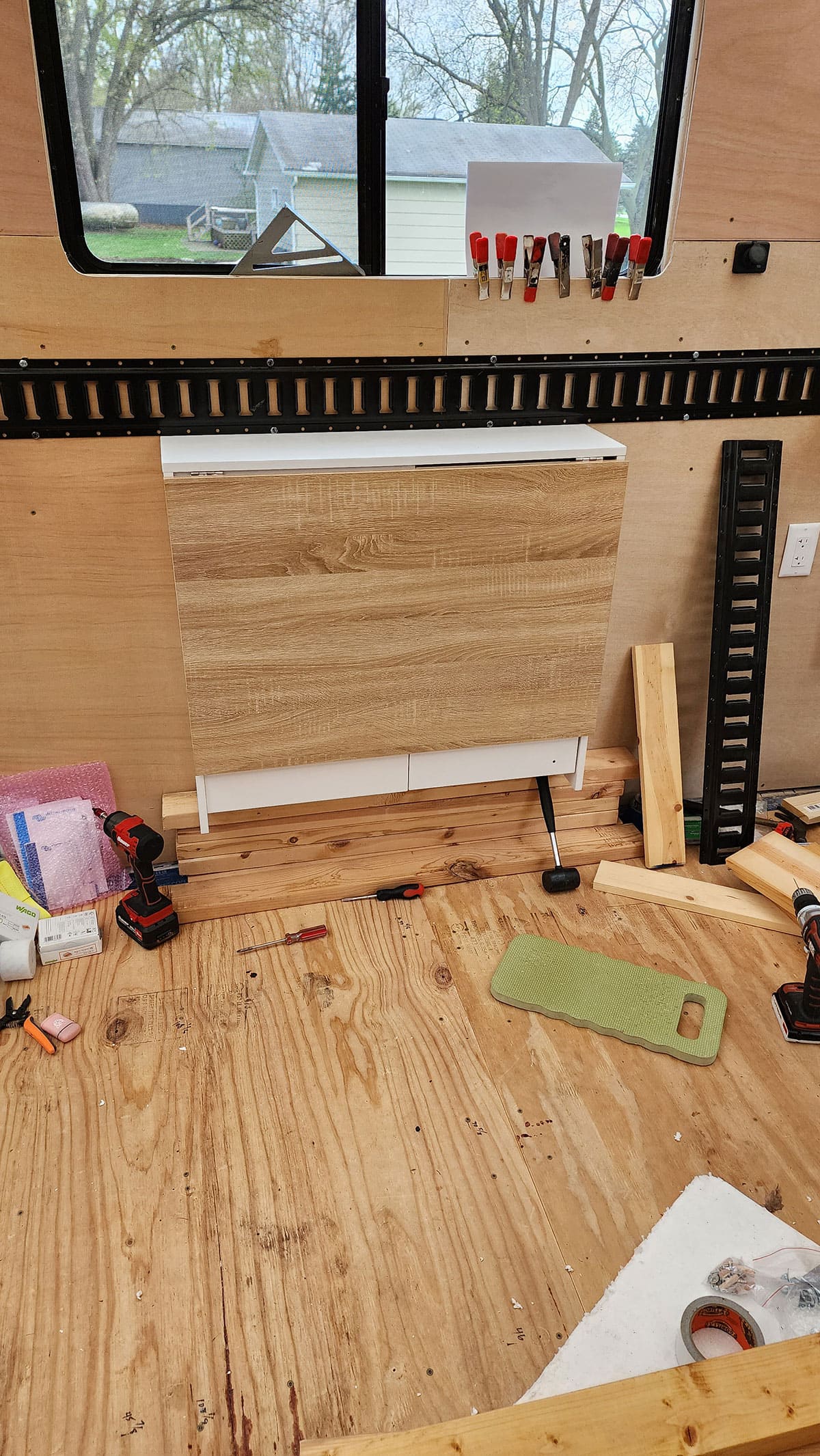 Fold up table in stowed position.