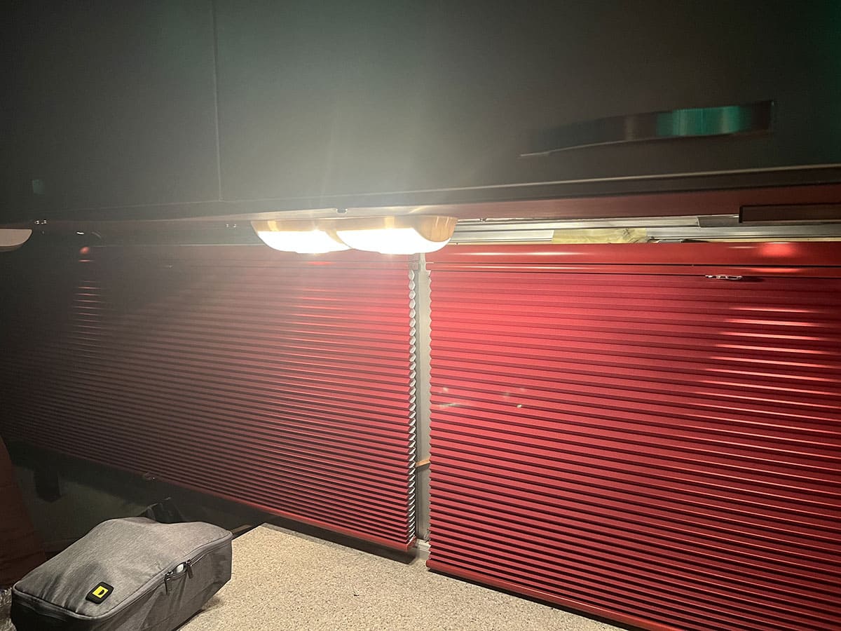 Dome lights as used in conventional contemporary RVs. They are hooked up to 12 volts and function even when the bus isn’t hooked up to shore power or the generator.