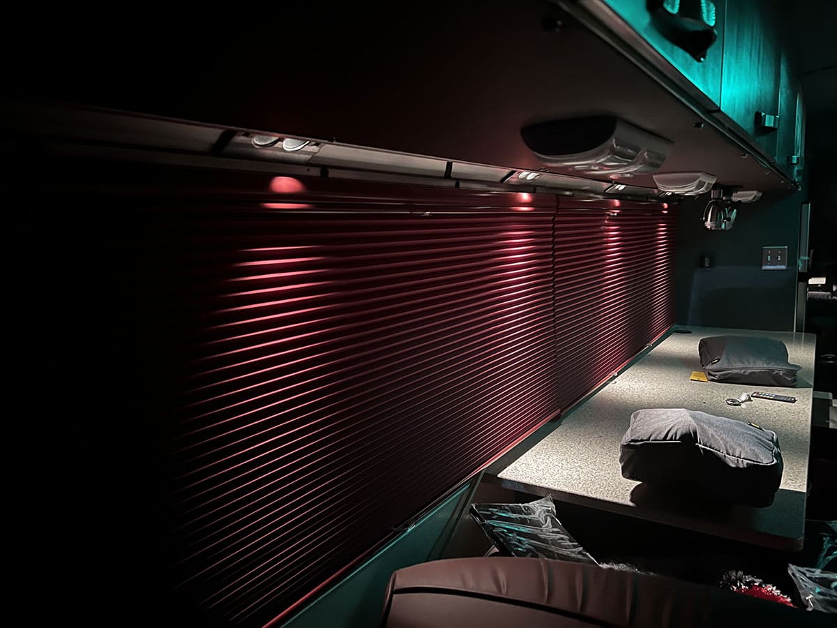 The original vintage reading lights have been retained and are operated from the driver's seat. These run off the buses' 24-volt chassis batteries.