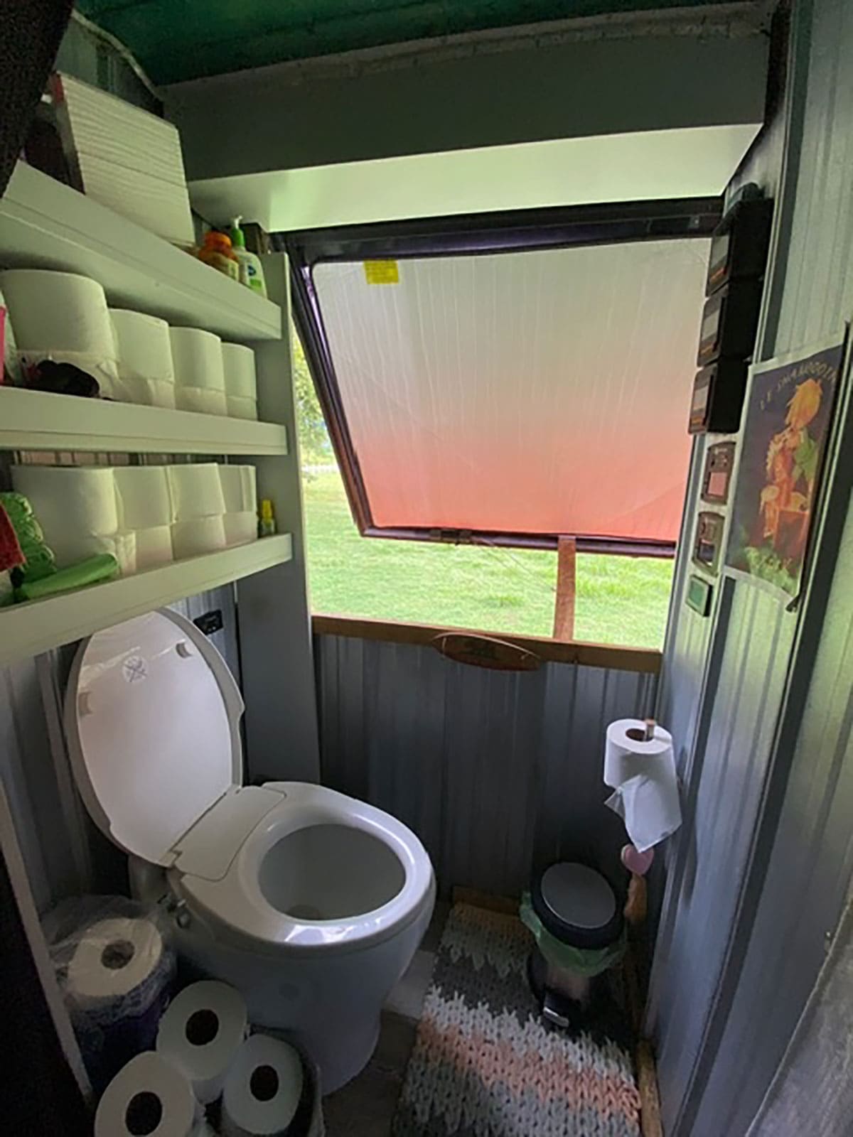 The bathroom, with its spacious shower and bidet-equipped toilet, provides a touch of luxury on the road.
